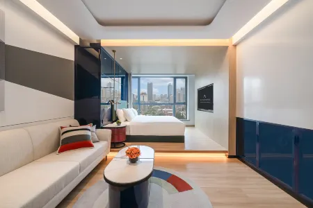 Shanghai Xujiahui A.T.HOUSE Jia Di Hotel Отели рядом с достопримечательностью «Shanghai Xuhui Gymnasium»