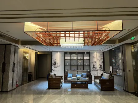 Hunteriya Business Hotel Отели рядом с достопримечательностью «Lvliang Administration College Wenshui Branch»