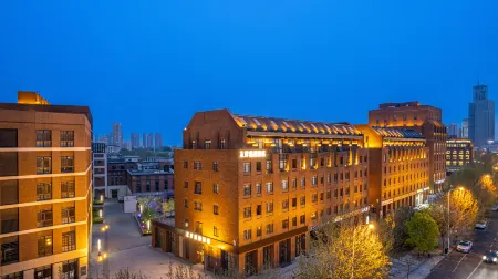 Tian jin zuo an Yibai Hotel Отели рядом с достопримечательностью «Dongli Square»