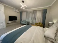 QINHEYUAN APARTMENT Hotel di Shuangjiang Lahu, Va, Blang and Dai Autonomous County