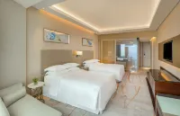 Sheraton Qingdao West Coast Hotel(Golden Beach Hotel) Отели в г. Циндао