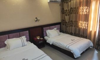 Pingle Tongle Business Hotel