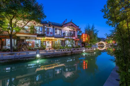 Jiangnan Mingyue Guesthouse Отели рядом с достопримечательностью «Chuxiong Normal University»