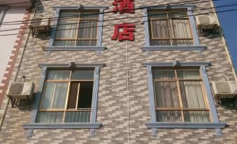 Huaning Yuxing Hotel