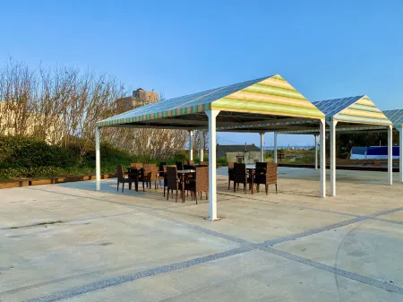 Bayhouse Hostel Penghu Отели рядом с достопримечательностью «Национальный пейзаж Чуйху»