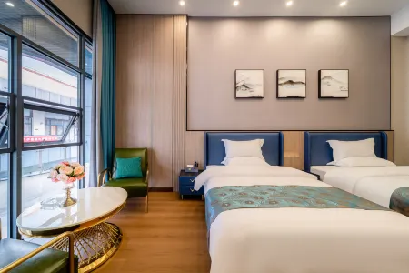 Yu'an Dongsheng Hotel (Yulong Moore City Branch) Отели рядом с достопримечательностью «Huajianchi·chunshang Hot Spring Theme Park»