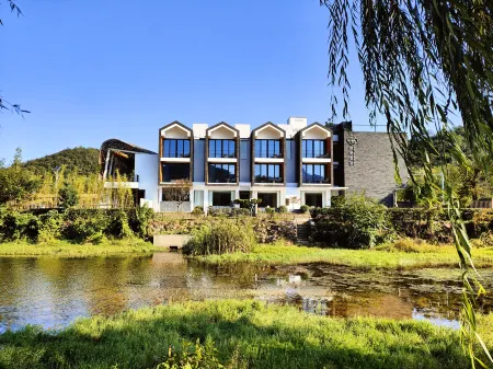 Changxing Yanqi Vacation Отели рядом с достопримечательностью «Changxing Badujie Scenic Area»