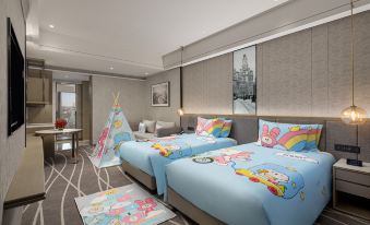 a spacious bedroom with large beds adorned with pictures on the wall above them at Crowne Plaza Shanghai Nanjing Road