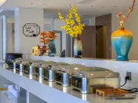 Huaxin Civil Aviation Hotel (Xinyang East High-speed Railway Station) - servizio colazione