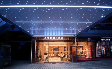 Wisdom  Holiday Hotel Отели рядом с достопримечательностью «Giant Buddha in Rong County»