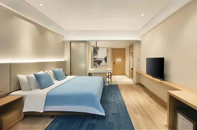 Xingyi Bushi Smart Hotel (Jushan Square RT-Mart)