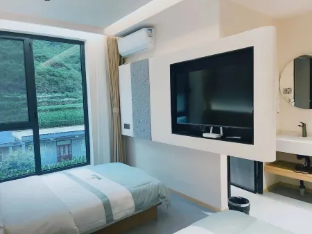 Jinnong Mountain Hotel Homestay Отели в г. Хугуань