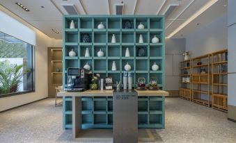 Liyi Hotel (Xishuangbanna Jinghong Mengle Grand Buddha Temple Manchester Rainforest Park Branch)