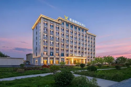 Vienna International Hotel (Qianquan Lake Branch, Tacheng) - parking