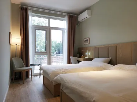 Shun 12 Homestay Отели рядом с достопримечательностью «National Defense Art District»