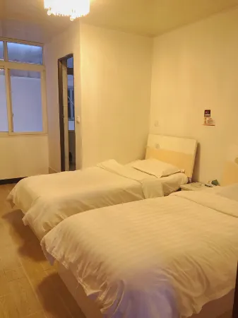 Asbestos Shunxiang Inn Отели рядом с достопримечательностью «SiChuan YaAnShi ShiMianXian BuXingJie»