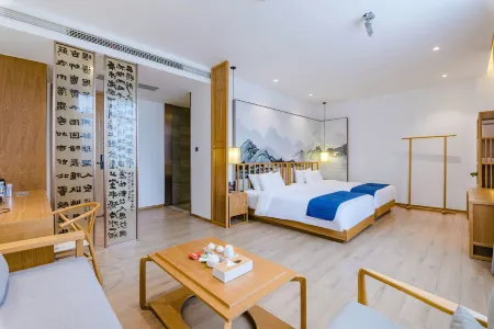 Xinyang Nanwan Lake Camellia Hotel Отели рядом с достопримечательностью «Xinyang Normal University»