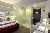 Grand Darmo Suite by AMITHYA Hotels in Wonokromo