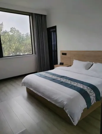 Xinyi Express Hotel Отели рядом с достопримечательностью «Guanque Tower»