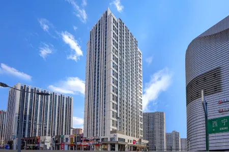 Manju Hotel (Harbin West Railway Station Wanda) Отели рядом с достопримечательностью «Heilongjiang University»