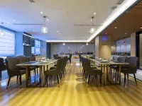 Magnolia Hotel (Jining Jinxiang Garlic Shopping Plaza Kuixing Road Branch) - فطور