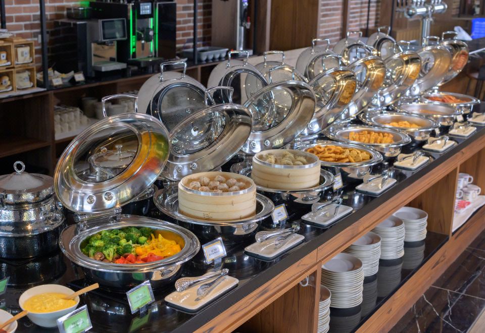 Golden Tulip Jan Da Hotel-Taichung의 편안한 침실 전경