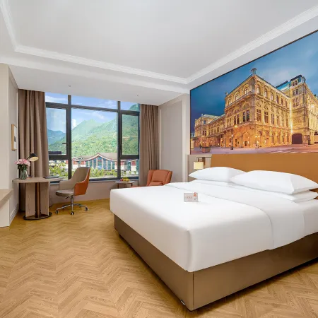 Vienna Hotel(Xingshan High Speed Rail Station Store)