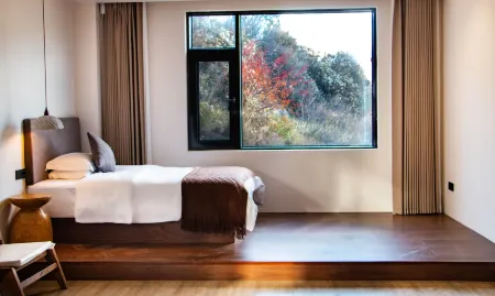 Deqin Zangshan Yunju Hotel Отели рядом с достопримечательностью «Wunongding Viewing Platform»