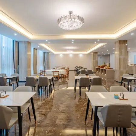 Mingtong Hotel Отели в г. Чжаотун