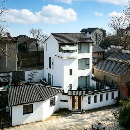 Dongdi Xinting Riverview Courtyard Beauty Inn (Youbu Ancient Street Store)