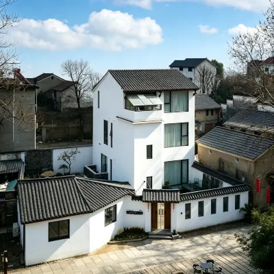 Dongdi Xinting Riverview Courtyard Beauty Inn (Youbu Ancient Street Store) - Airport Shuttle