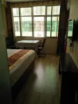 Mizhi Xiaocheng Business Hotel