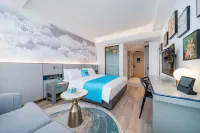 Lan ou Shangpin Hotel (Lanzhou Zhongchuan Airport Rainbow City) Отели рядом с достопримечательностью «Университет Пекинхимической Профессии Ланьчжоу (Новый район Ланьчжоу)»