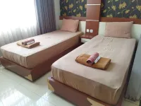 Karunia Hotel by Surya Group Hotels near Toko Grosir Sembako Haji Ulin Nuha