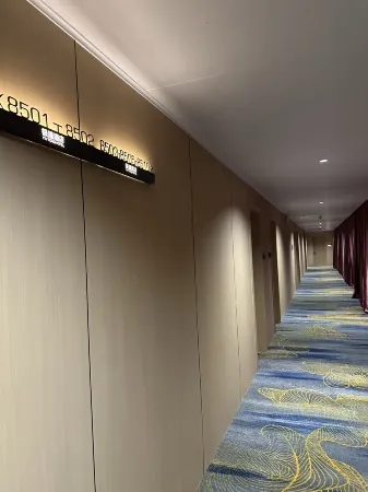 Wanzai Yintong Concept Hotel Отели рядом с достопримечательностью «Wanzai Dazhong Polytechnic Science & Technology School»