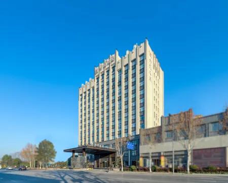 Huzhou Changxing Si'an Maison New Century Hotel Отели рядом с достопримечательностью «Changxingxian Mountain»