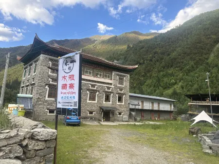 Muya Cangzhai Homestay Отели рядом с достопримечательностью «Lotus Sea»