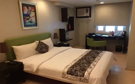 The Exchange Regency Residence Hotel Manila Managed by HII Отели рядом с достопримечательностью «Масджид Аль-Дахаб»