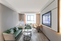 Huiyuan Jinjiang International Hotel Hotel di Stasiun Kereta