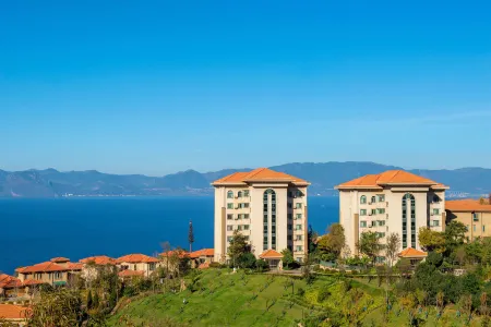 Weiyun Lvju Guesthouse Отели рядом с достопримечательностью «Beach Park»