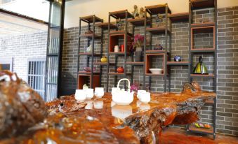 Floral Hotel · Mountain Whisper Hotel(Shennongjia Wooden fish store)