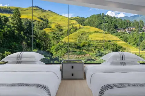 โรงแรมเฟิงยี่ หลงเซิง (นาขั้นบันไดหลงจี จินฝอเติง) - ที่มีอ่างอาบน้ำ