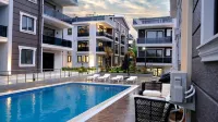 Flower City Suits Hotels near Akraba Beach