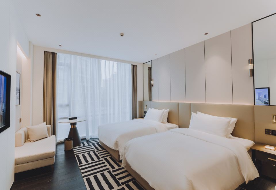 웰 스테이 호텔의 깨끗한 객실 이미지
