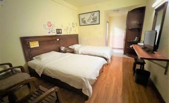 Yulin Mingxin Hotel (Qingning Road Maternity and Child Hospital Shop)