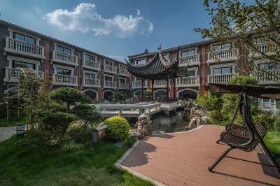 Maison New Century Hotel Zhenze Suzhou Hotels near Meilong Community Gate Ball Field