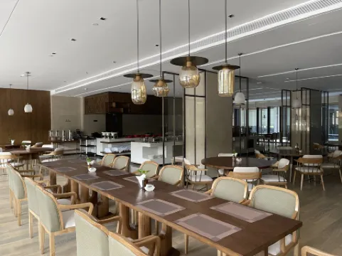 SHININGMAN HOTEL Отели в г. Цзясин