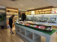 Ou Si Ka lnternational Hotel - servizio colazione