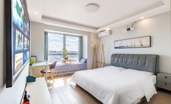 Tuyuan Holiday Apartment (Weihai Railway Station Hanlefang West Street)