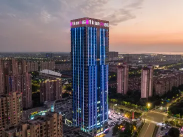 Echarm Plus Hotel (Suzhou Wujiang East Taihu Wanbao Shopping Plaza)